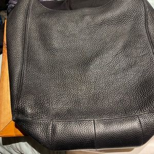 Large size auxiliary black leather bag from Aritiza   See photos.